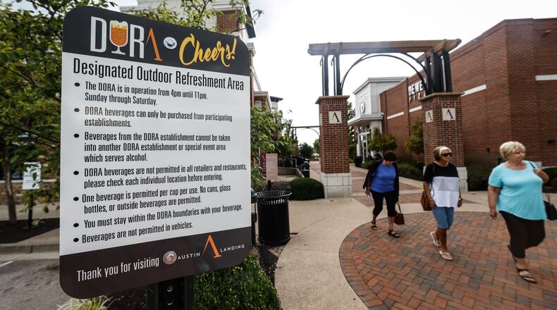 Austin Landing outdoor drinking district is already looking to expand. DORAs launched in Ohio in 2015 as an economic development tool and way to garner exposure for communities and businesses alike. JIM NOELKER/STAFF