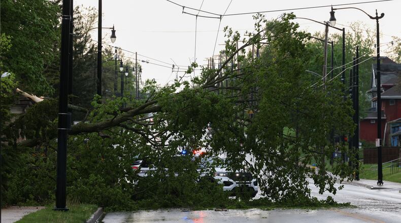 The southbound lanes and one northbound lane on Salem Avenue near Yale Avenue are blocked due to a tree that fell during a thunderstorm on Tuesday afternoon, April 29, 2025. BRYANT BILLING / STAFF