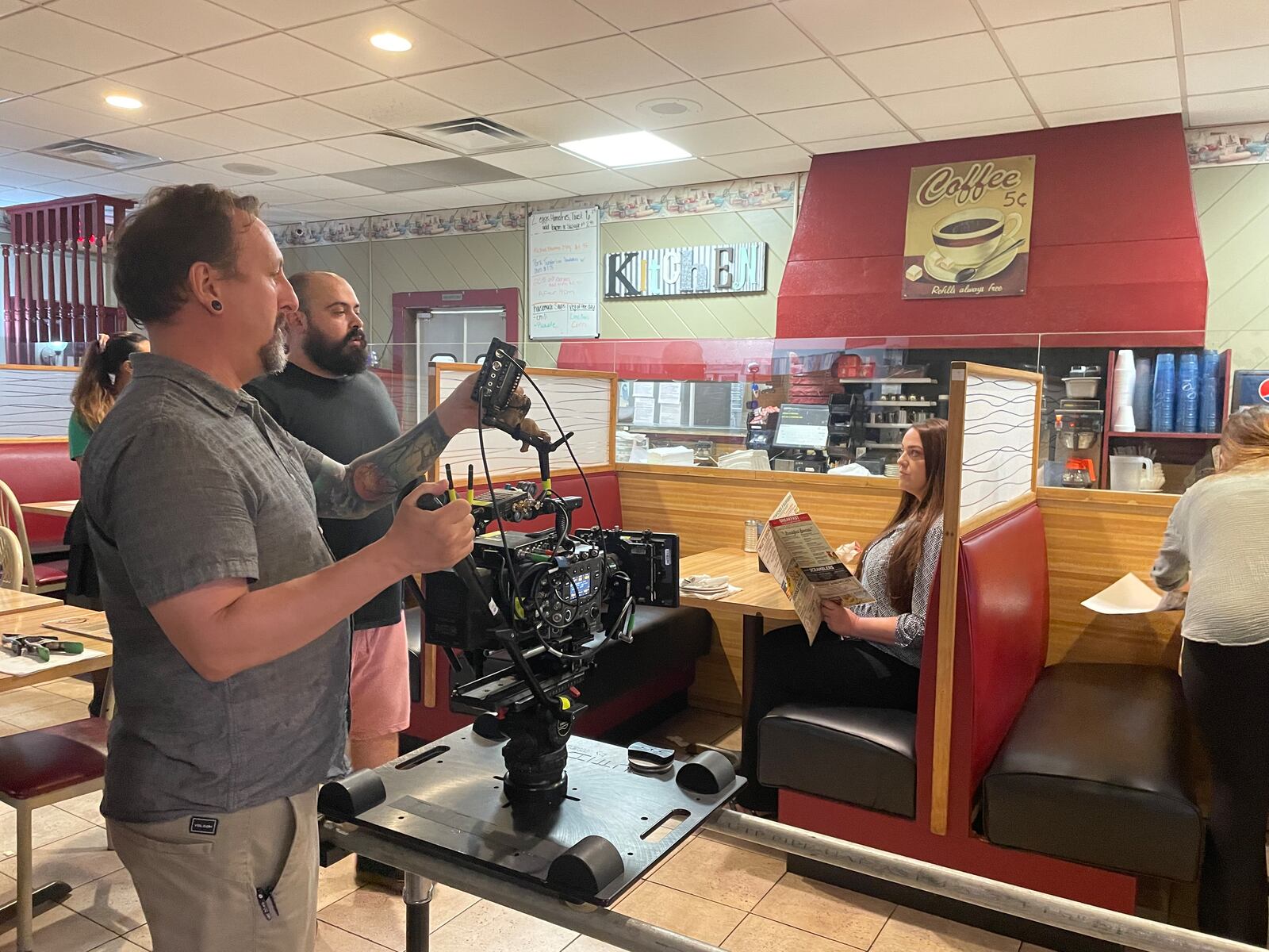 After hours, George’s Family Restaurant in Dayton turns into the set of a new independent feature film called ‘Another Day.’ NATALIE JONES/STAFF