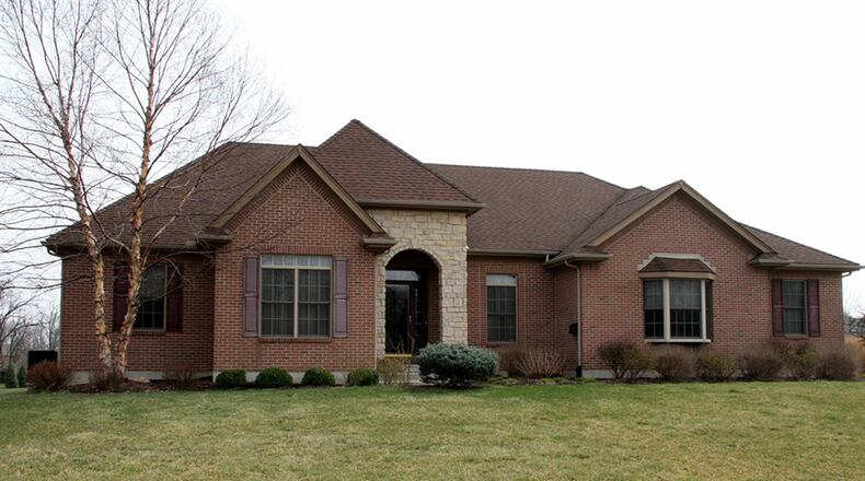 The brick ranch on a corner lot has about 4,500 square feet of living space. The lower level has been finished to include a recreation room, family room, bedroom, exercise room, half bathroom and a possible wine cellar. CONTRIBUTED PHOTOS BY KATHY TYLER