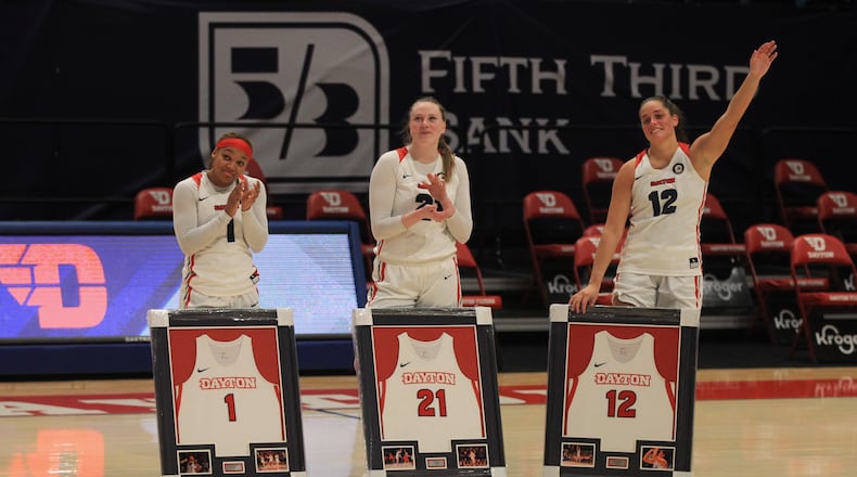 Dayton honors seniors Araion Bradshaw, Erin Whalen and Jenna Giacone after a game against Saint Louis on Saturday, Feb. 20, 2021, at UD Arena. David Jablonski/Staff