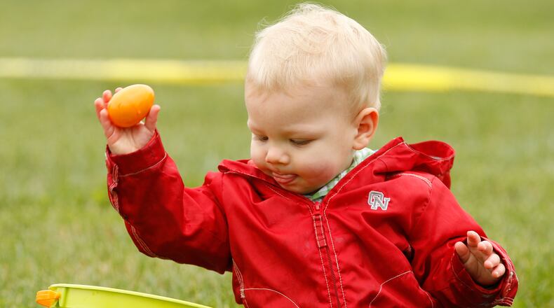A child enjoys his first Easter egg hunt in a 2012 file photo. BARBARA J. PERENIC / STAFF FILE