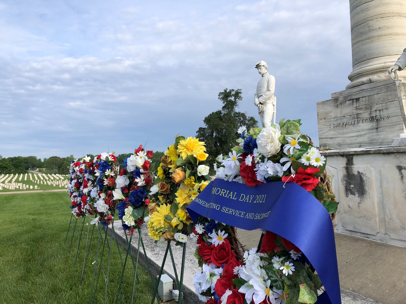 The Dayton National Cemetery held a private wreath laying ceremony on Monday to honor veterans and their families. STAFF/BONNIE MEIBERS