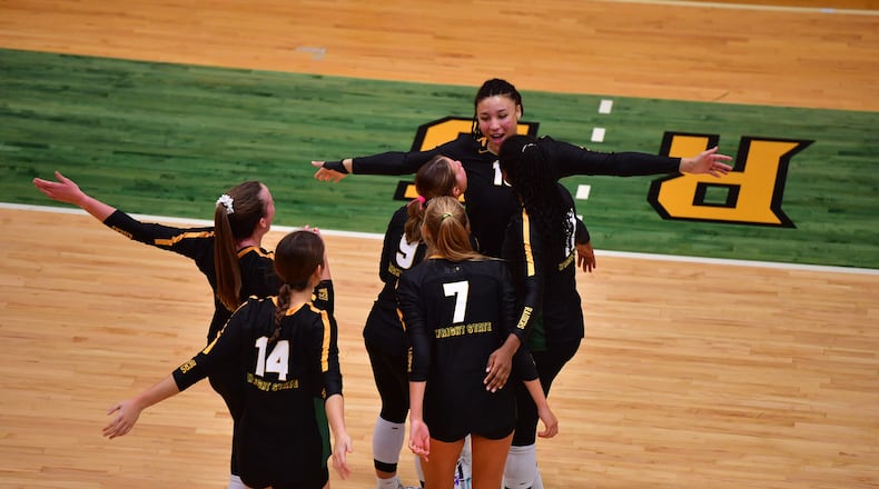 Wright State celebrates a point during a match vs. Cleveland State earlier this month. Joe Craven/Wright State Athletics