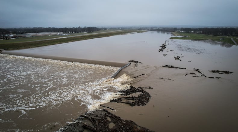 Plans are in the works to build a whitewater park and community gathering space on the Great Miami River near North Alex Road in West Carrollton. The $7.5 million project along the riverfront would include a 900-foot whitewater channel around the South Montgomery Low Dam, competition level whitewater features for kayaks and wave surfing, and safety modifications aimed at improving safety, use and access to the river. JIM NOELKER/STAFF
