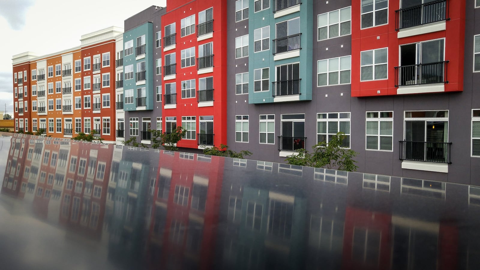 Liberty Center Premier Town Center in Liberty Township offers a wide range of dining, shopping and entertainment options. This is a section of apartments overlooking the retail spaces. NICK GRAHAM/STAFF