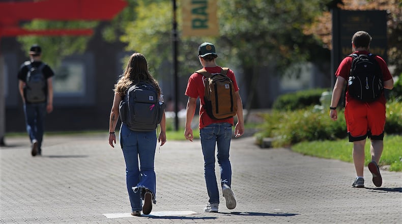 Wright State students walk to classes Wednesday Aug. 24, 2022. 
President Joe Biden is set to announce $10,000 federal student loan cancellation for many.  MARSHALL GORBY\STAFF
