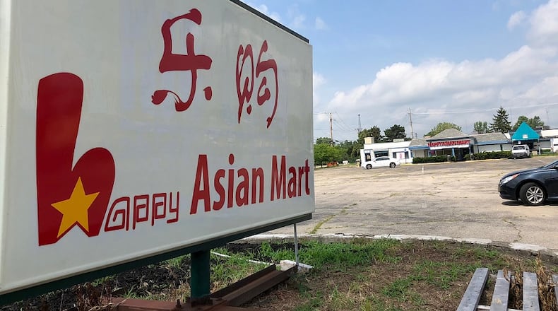 Happy Asian Mart has opened in the space once occupied by the Colony Club. MARK FISHER/STAFF