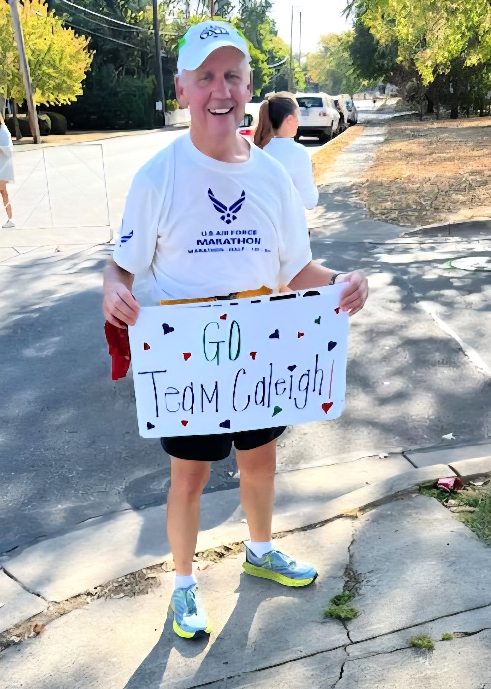 Struggling to finish last year’s marathon, Stars runner Steve Wirick of Vandalia said he needed “an angel” to lift him and found his at the 16 mile mark when he saw an uplifting sign that read “Go Team Caleigh.” It was held by his friends, Randy and Bonnie Hildebrandt, whose late daughter Caleigh remains one of the most inspirational stories in the history of the race. Although she endured spina bifida from birth, the charming 24 year old woman competed in the 2016 race by riding in a burley stroller that was pushed by her dad the complete 26.2 miles. Father and daughter were cheered by the entire crowd when they finished. Caleigh died from cancer a couple of weeks after the 2017 race, but remains a legendary figure and an inspiration to many runners. CONTRIBUTED PHOTO