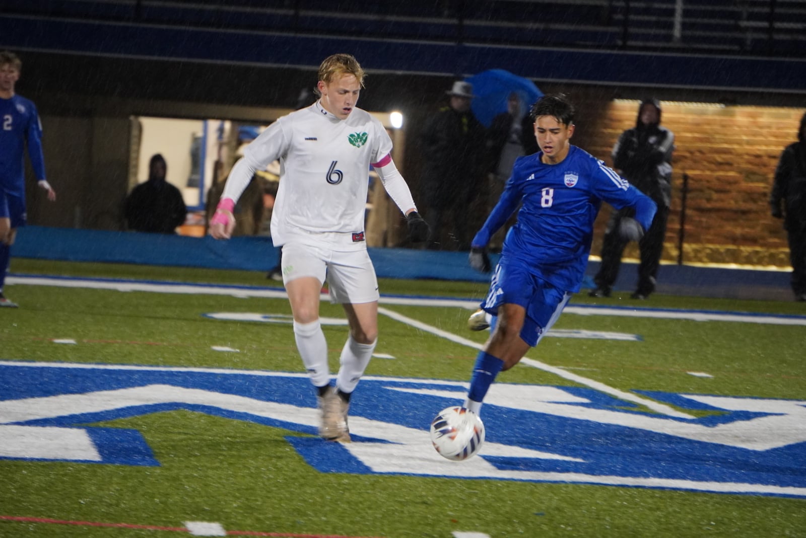 Badin High School senior Colt Long dribbles past Carroll sophomore Tadeas Fedorisin during their Division III regional semifinal match on Wednesday at Williamsburg High School. The Rams won 1-0 in penalty kicks. CHRIS VOGT / CONTRIBUTED