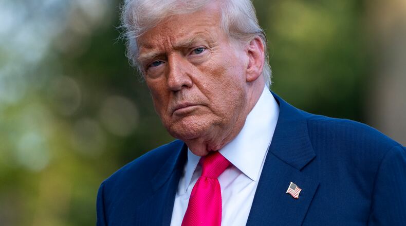 FILE - President Donald Trump walks from Marine One after arriving on the South Lawn of the White House, Tuesday, July 15, 2025, in Washington. (AP Photo/Alex Brandon, File)