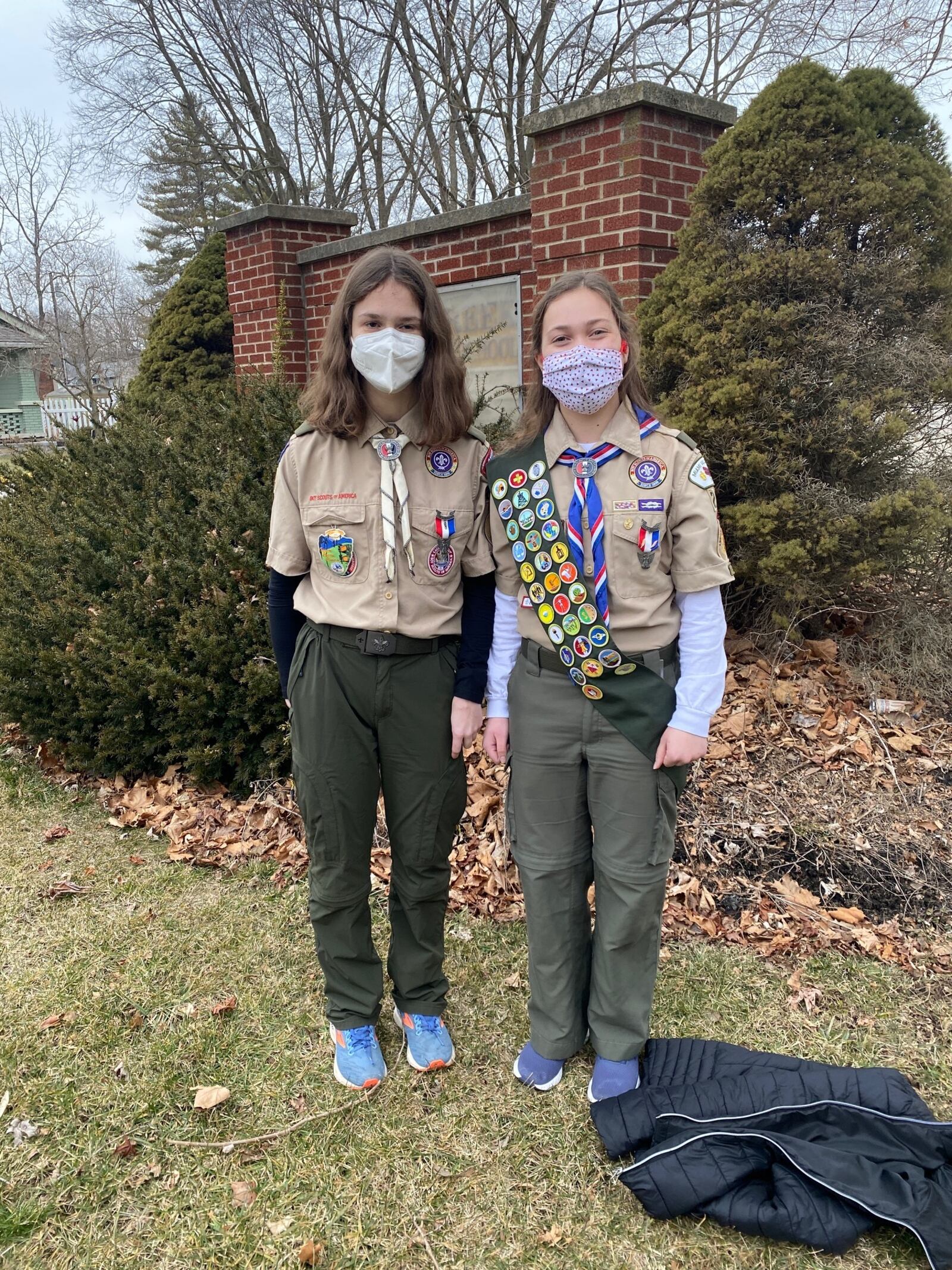 Dasha Crocker, left, and Liesl Carter, right, receive their Eagle Scout award. The girls are the first two female Eagle Scouts in the Miami Valley Council. CONTRIBUTED