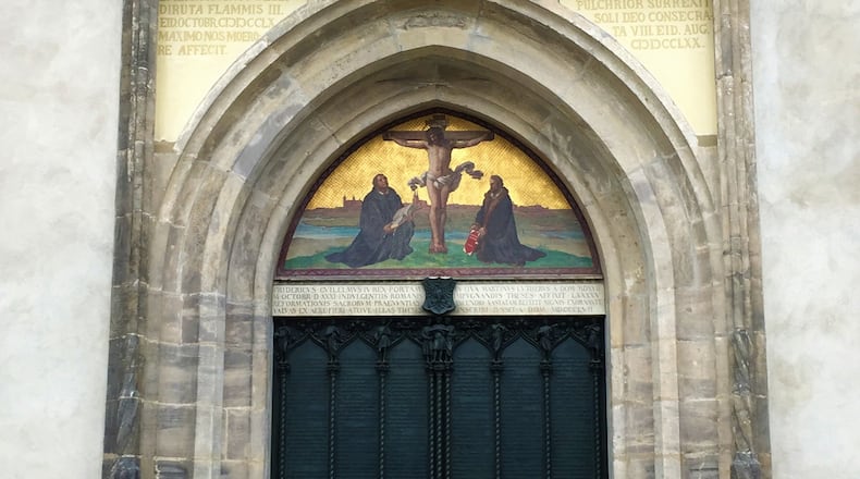 The doors of Castle Church in Wittenberg, where Martin Luther posted his 95 theses that questioned the Catholic Church and helped pave the way for the Protestant Reformation 500 years ago this October. (Amy S. Eckert/Chicago Tribune/TNS)