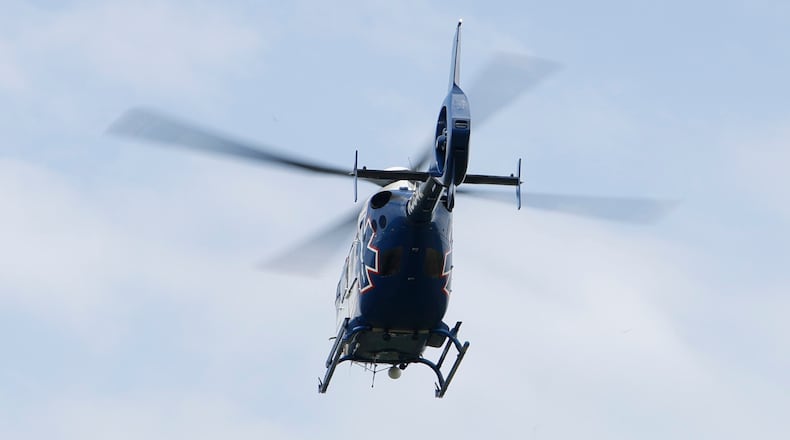 A CareFlight medical helicopter is headed to Miami Valley Hospital in Dayton. BILL LACKEY/STAFF