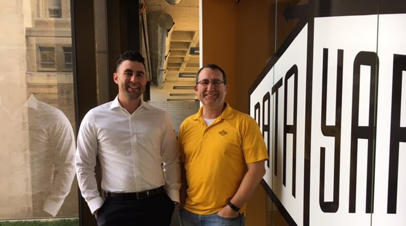 The son-and-father team of Alek (left) and David Mezera guide web and cloud-hosting services firm DataYard to locally focused success. THOMAS GNAU/STAFF