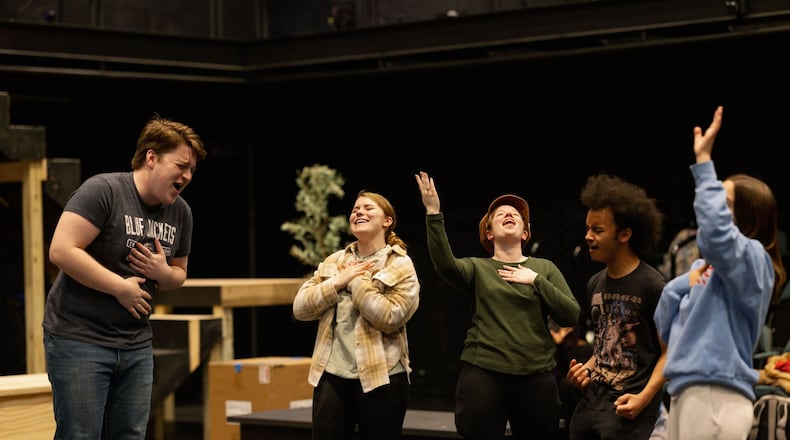 Left to right: Henry Reisbeck leading "All Good Gifts" with Megan Carlson, Anna Delaney, Darian Watson, and Kaitlyn Crowell in University of Dayton's production of "Godspell." PHOTO BY SYLVIA STAHL