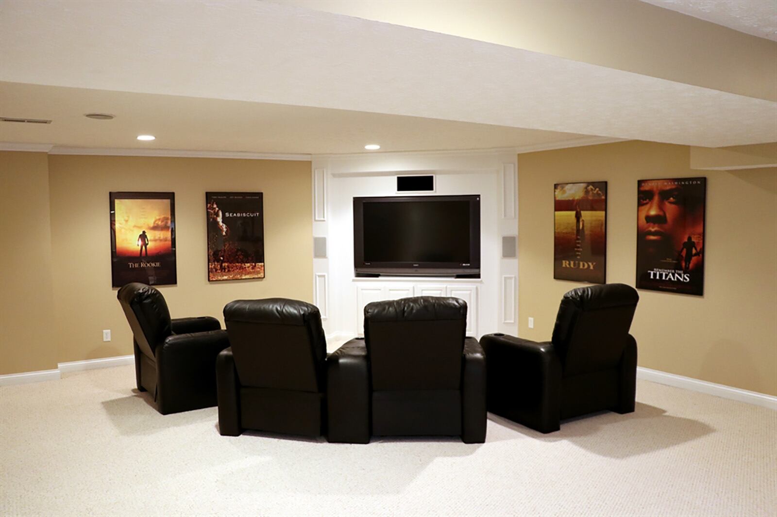 The basement has been finished into a recreation room with built-in media area. There is a bonus room, which is currently set up as an exercise room. CONTRIBUTED PHOTO BY KATHY TYLER