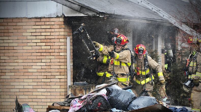 Several dogs perished in a fire Monday, Jan. 30, 2023, that damaged a large portion of a house ion Tilbury Road in Huber Heights. MARSHALL GORBY/STAFF