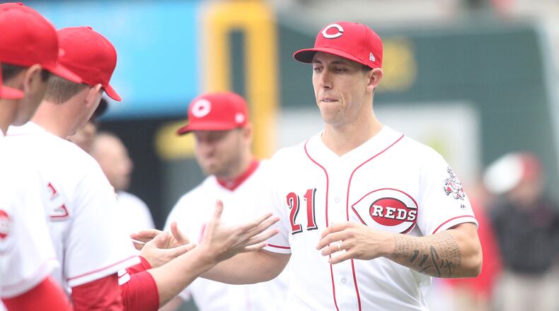 Reds reliever Michael Lorenzen is introduced before a game against the Nationals on Opening Day on Friday, March 30, 2018, at Great American Ball Park in Cincinnati. David Jablonski/Staff