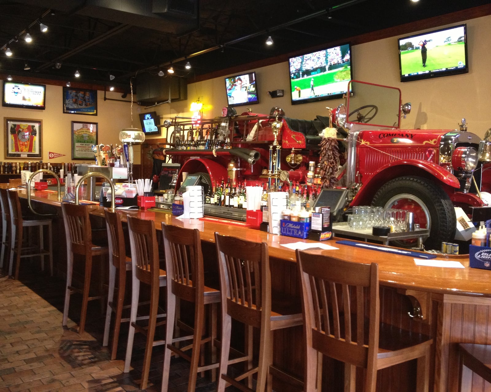 The bar at Company 7 BBQ in Englewood features an antique fire truck. Contributed photo by Alexis Larsen