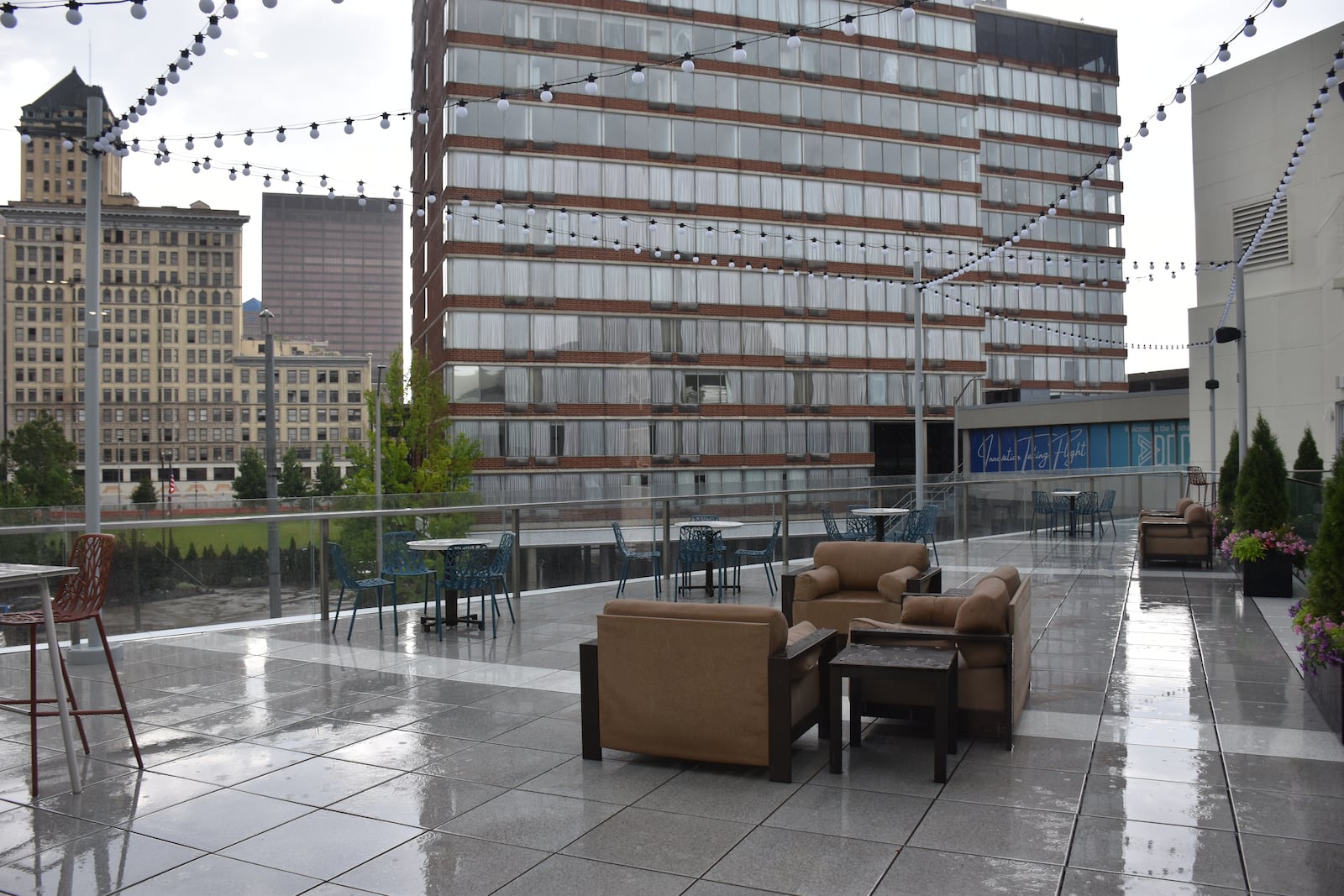 The terrace on the third floor of the Dayton Convention Center. The terrace provides outdoor gathering space and cover from the elements to people outside the entrance on the ground level. CORNELIUS FROLIK / STAFF