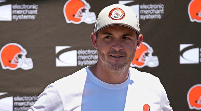 FILE - Tommy Rees, Cleveland Browns tight ends coach, answers a question at a news conference during an NFL football practice in Berea, Ohio, June 13, 2024. (AP Photo/Sue Ogrocki, File)