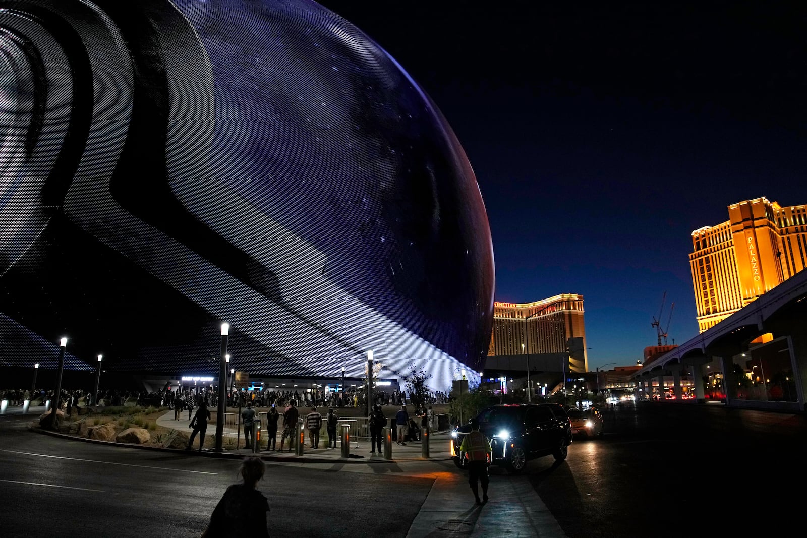 People arrive during the opening night of the Sphere, Friday, Sept. 29, 2023, in Las Vegas. (AP Photo/John Locher)