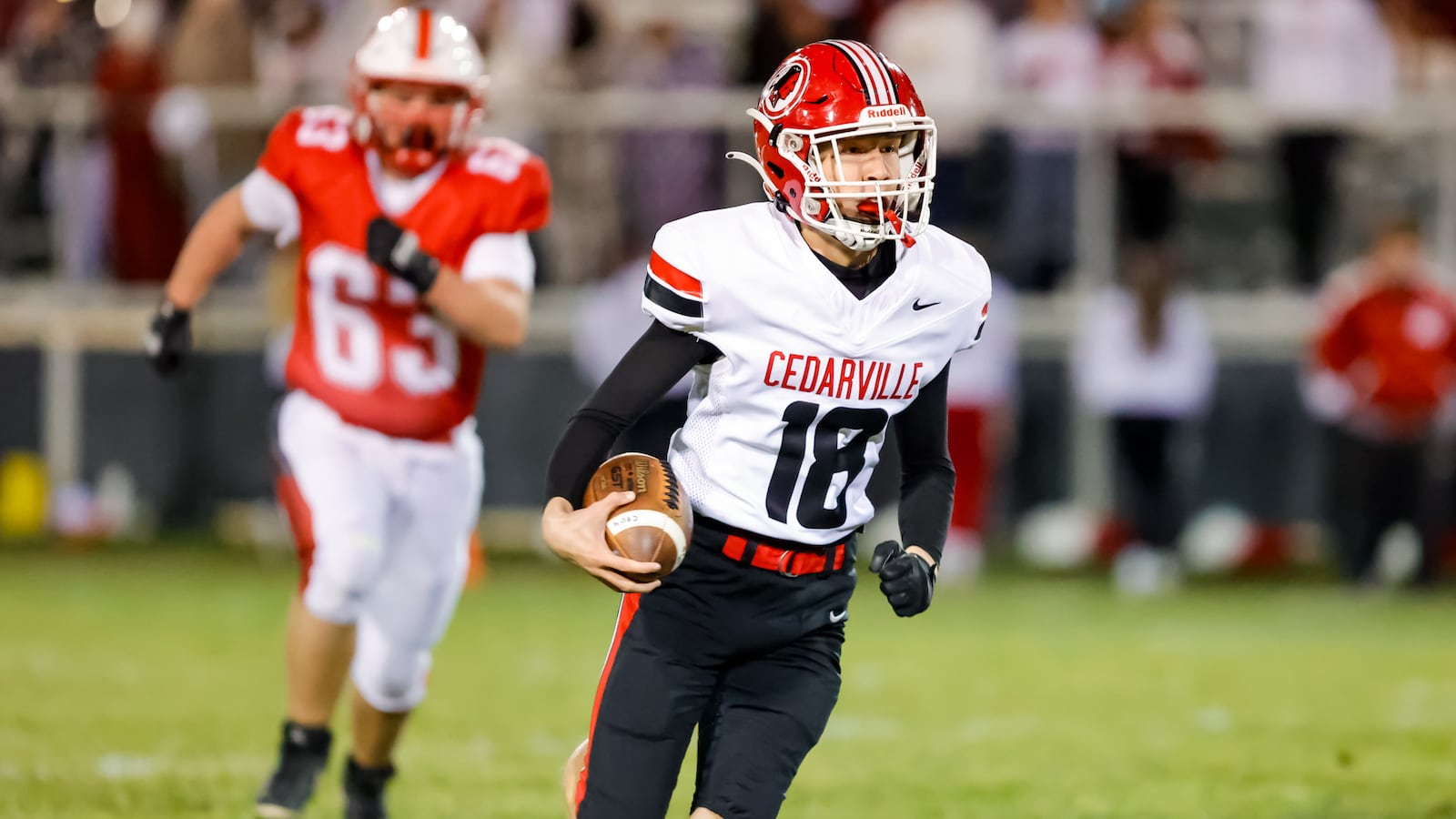 Cedarville High School freshman Wyatt Pyles carries the ball during their 43-3 win at Southeastern on Friday, Oct. 24 at Trojan Stadium. MICHAEL COOPER / STAFF PHOTO