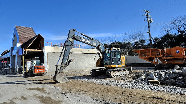 Panera Bread will add more space, a drive-through and parking after a demolition this week behind the Town & Country Shopping Center. MARSHALL GORBY\STAFF