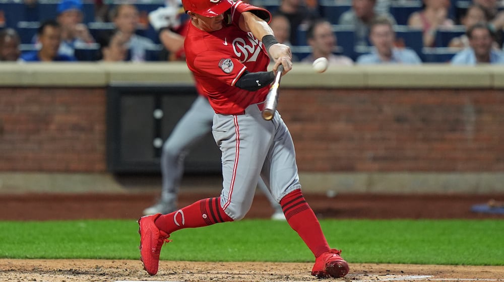 Cincinnati Reds' Austin Hays hits a home run during the sixth inning of a baseball game against the New York Mets Friday, July 18, 2025, in New York. (AP Photo/Frank Franklin II)
