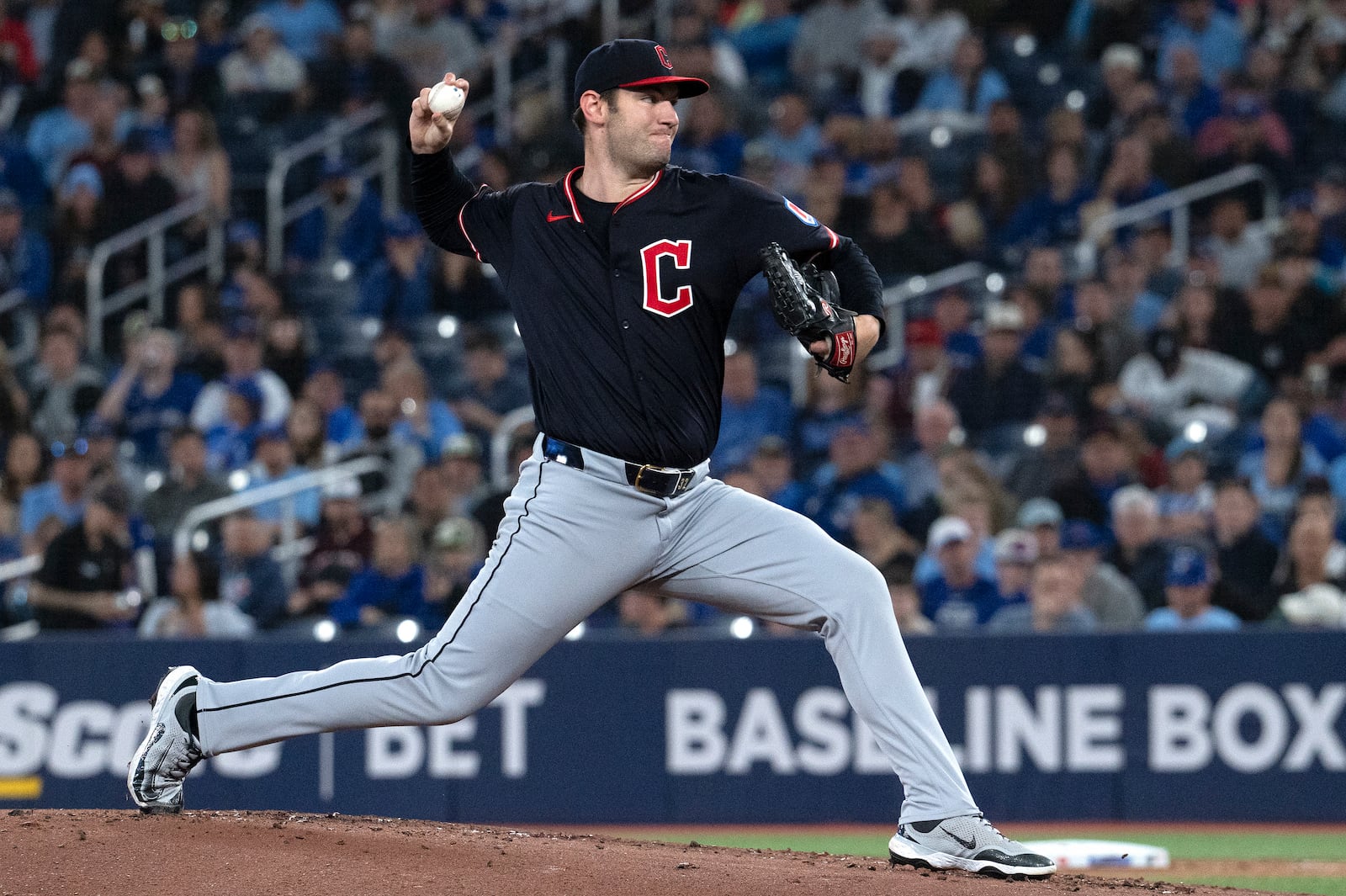 Cleveland Guardians starting pitcher Gavin Williams (32) throws to a Toronto Blue Jays batter during the first inning of a baseball game in Toronto, Saturday, May 3, 2025. (Jon Blacker/The Canadian Press via AP)