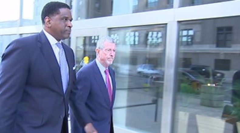 Former Dayton City Commissioner Joey D. Williams on Friday, Sept. 27, 2019, pleaded guilty and was convicted of one count of corruptly soliciting a bribe, a federal felony. Williams (left) is with his attorney, Patrick John Hanley. CHUCK HAMLIN/STAFF