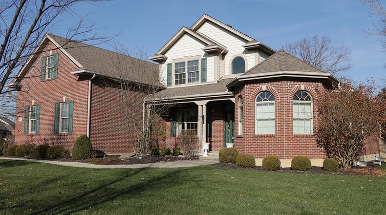 The 2-story home with about 2,810 sq. ft. of living space has a first-floor main bedroom, 4 bedrooms upstairs and a finished basement with media room and full bathroom. CONTRIBUTED PHOTO BY KATHY TYLER