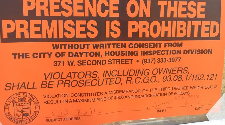 Residents of many of the tornado damaged apartments on Kelly Avenue have been ordered to vacate by June, 14 by the City of Dayton due to the lack of electricity, water or structural integrity. Nagy says her building has power and water. A letter from the city and this posting on the boarded up buildings were posted on Tuesday. MIKE CAMPBELL / STAFF
