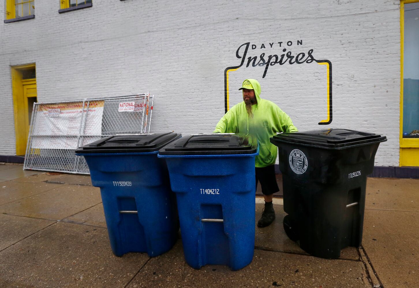 PHOTOS: Crews, party guests work to clean up Oregon District after Gem City Shine block party