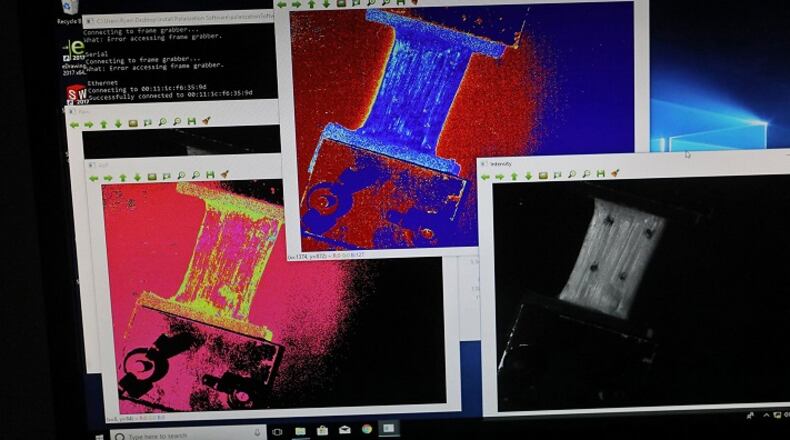 Different images of stretched joint tissue are projected onto a computer screen on Tuesday, July 31, 2018, at Whitaker Hall on the Washington University campus. The tissue was exposed to polarized light to show the different aspects of the tissue not seen with the human eye. (J.B. Forbes/St. Louis Post-Dispatch/TNS)