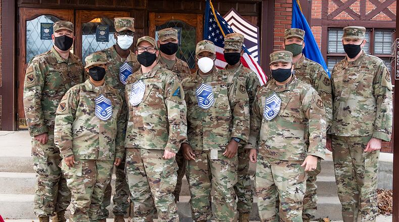 Members of Team Wright-Patt participate in the 2021 Chief Master Sgt. Drive Through celebration outside the Wright-Patterson Club at Wright-Patterson Air Force Base Dec 9. Only around 1% of the enlisted force are promoted to the rank of chief in their career. U.S. AIR FORCE PHOTO/WESLEY FARNSWORTH
