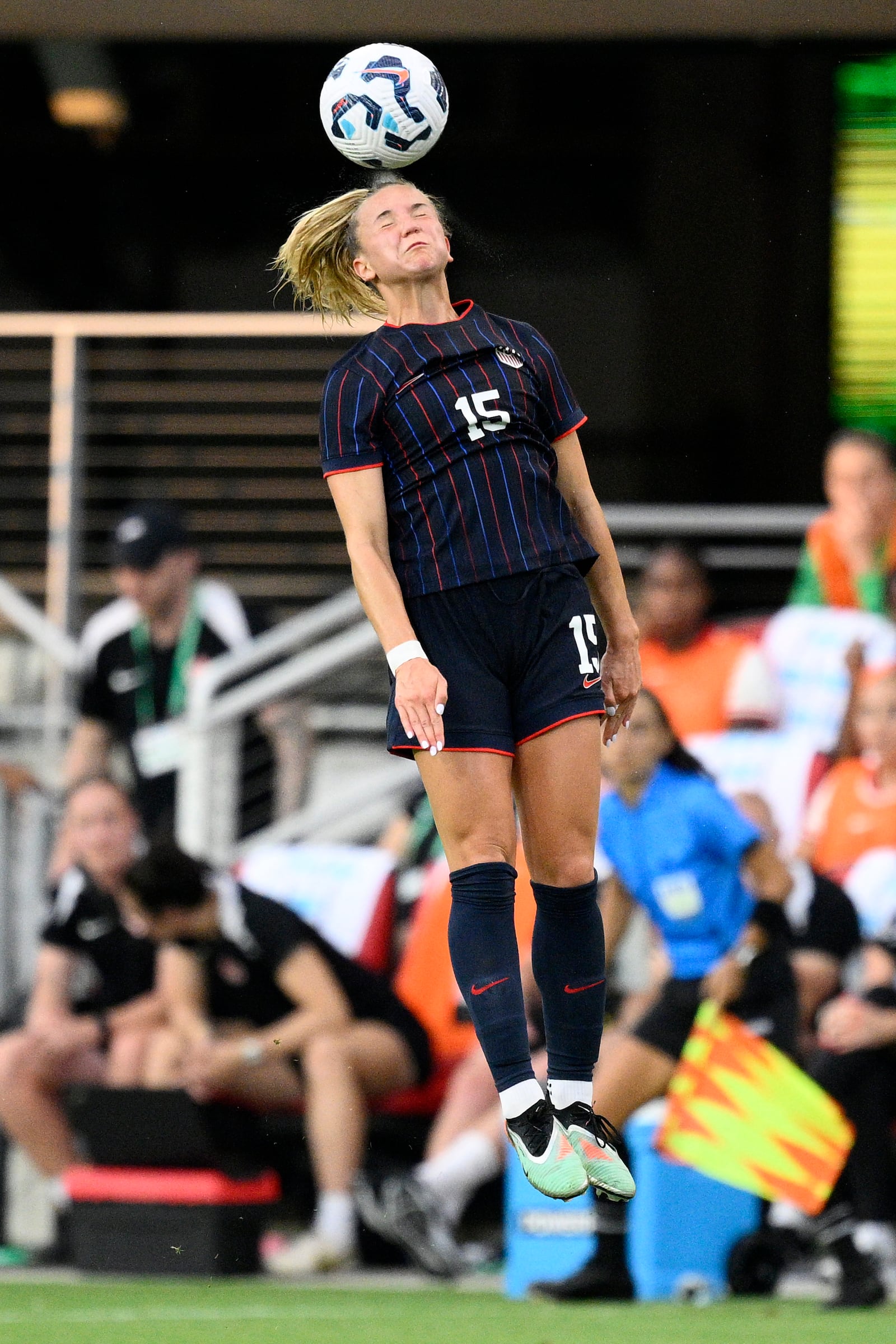 United States midfielder Claire Hutton (15) heads the ball during the first half of an international friendly soccer match against Canada, Wednesday, July 2, 2025, in Washington. (AP Photo/Nick Wass)