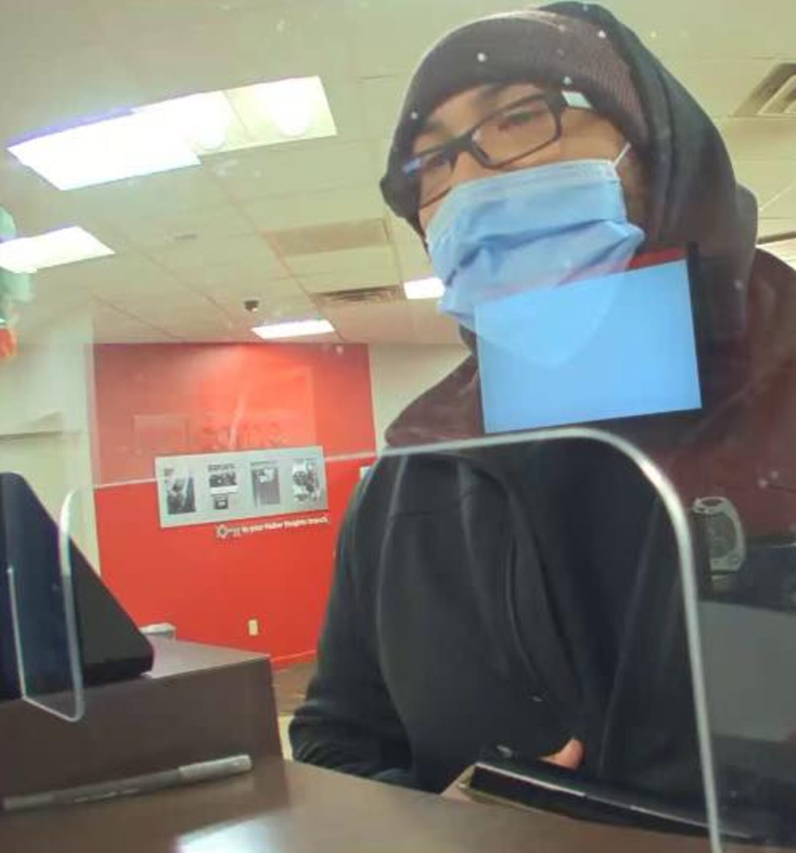 Huber Heights police are searching for a suspect in an armed robbery at the KeyBank on Chambersburg Road on Wednesday, Feb. 22, 2023. CONTRIBUTED