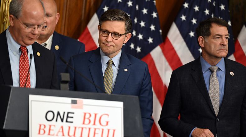 House Speaker Mike Johnson (R-La.), center, during a news conference at the Capitol in Washington on Thursday morning, May 22, 2025, after the House narrowly passed a wide-ranging bill to deliver President Donald Trump’s domestic agenda. The victory for Republicans came after Johnson made concessions to holdouts in several factions and Trump pressured the party to fall in line. (Kenny Holston/The New York Times)