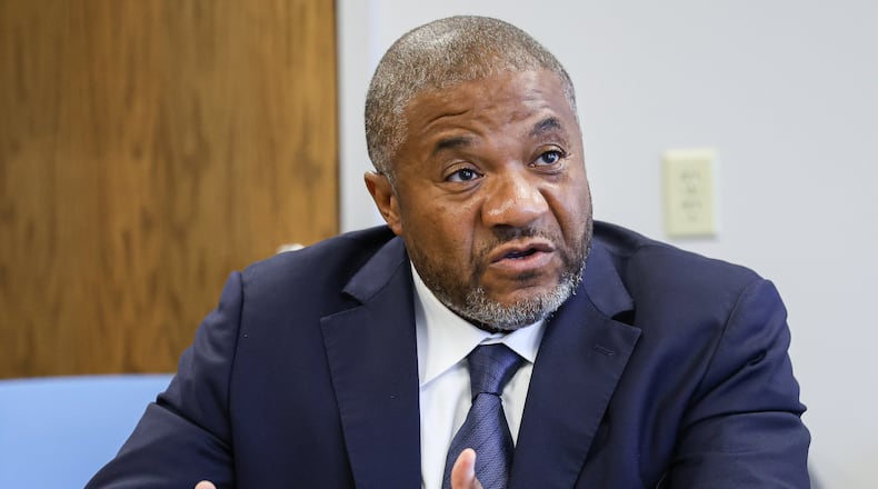 Dayton area attorney Michael Wright talks during a news conference on Thursday, July 24 at Wright and Schulte's office in downtown Dayton. He said he is launching an independent investigation into the reported death of Hershall Creachbaum Jr. at the behest of the boy’s estate. BRYANT BILLING / STAFF
