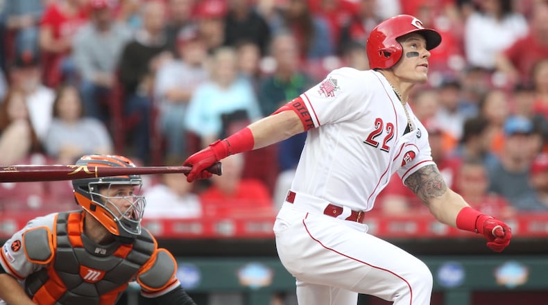 The Reds' Derek Dietrich hits two three-run home runs against the Giants in the first and third innings on Friday, May 3, 2019, at Great American Ball Park in Cincinnati.