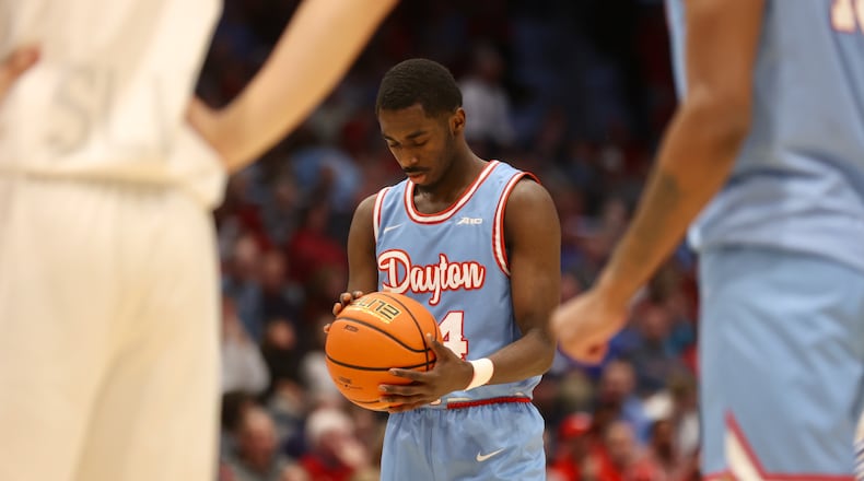 Dayton's Kobe Elvis prepares to shoot a free throw against Saint Louis on Tuesday, Jan. 16, 2024, at UD Arena. Elvis made the free throw to set a new school record with 37 consecutive made free throws. David Jablonski/Staff