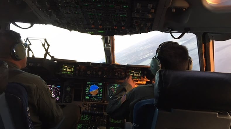 Lt. Col. Brett Manger, C-17 aircraft commander (left) and co-pilot Richard M. Smith prepare to land the jet at Homestead Air Reserve Base, Fla., after picking up troops and supplies from four states on a relief aid flight for Hurricane Irma survivors. The crew with the Air Force Reserve 445th Airlift Wing started and ended the Sept. 12, 2017, journey at Wright-Patterson Air Force Base. Like the Air Force, the unit faces a pilot shortage of its own. BARRIE BARBER/STAFF