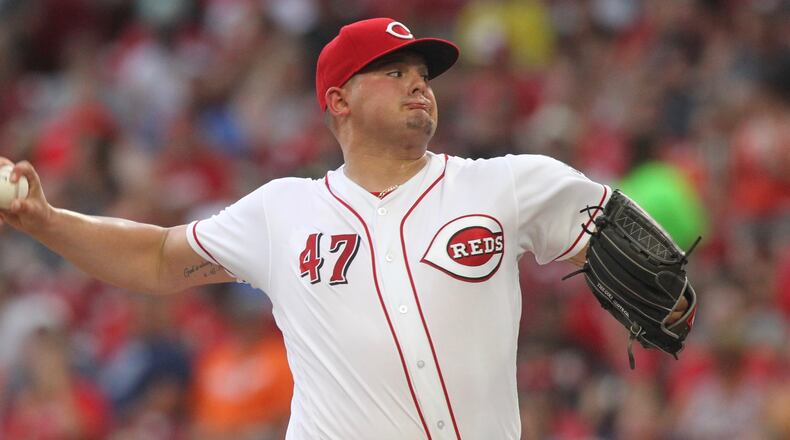 Reds starter Sal Romano pitches against the Tigers on Tuesday, June 19, 2018, at Great American Ball Park in Cincinnati.