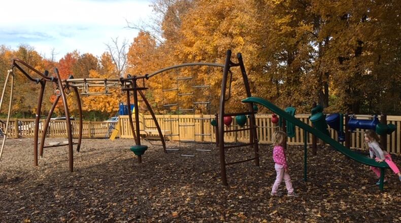 Due to the efforts of the Liberty Twp. MOMS Club and Eagle Scout Chase Oswald the playground area at Dudley Memorial Park has a new protective fence.