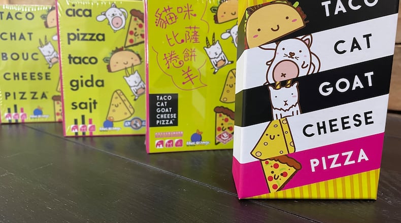 Dolphin Hat Games, a game maker based in Englewood, has been featured on multiple national gift guides this year for its flagship card game, Taco Cat Goat Cheese Pizza.