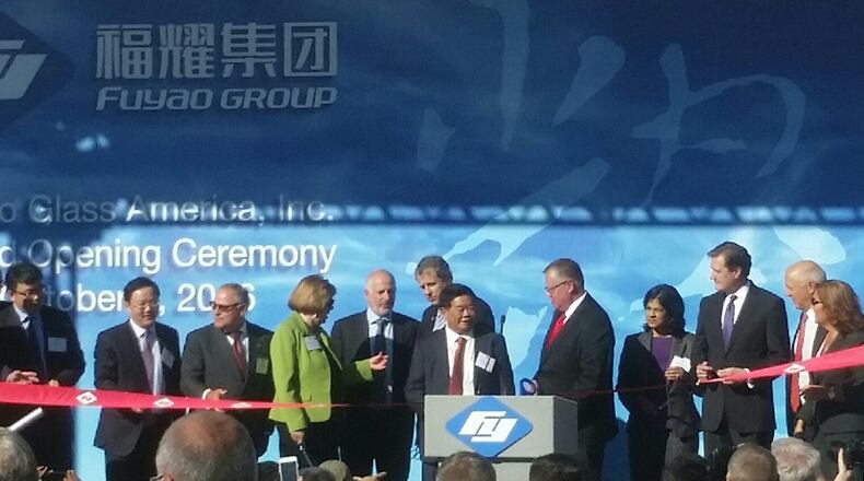 Fuyao, government and state officials cut a ribbon Friday in celebration of the company’s grand opening