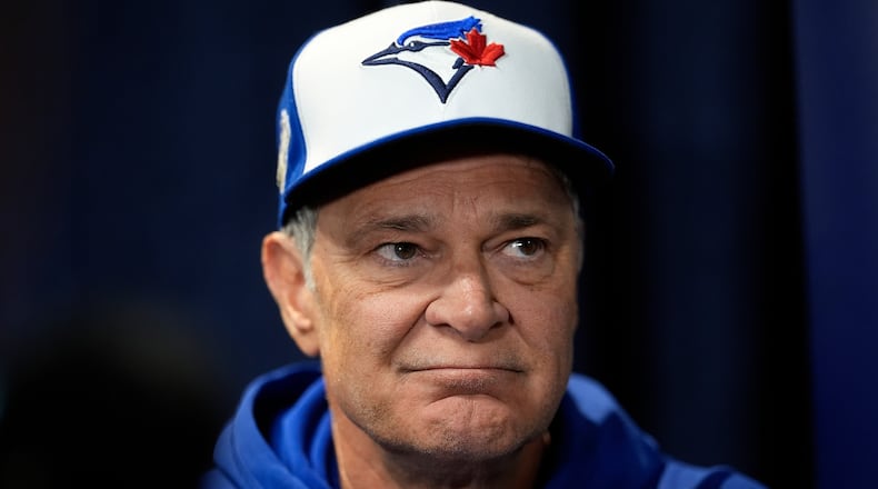 FILE - Toronto Blue Jays bench coach Don Mattingly speaks during a World Series baseball media day, Thursday, Oct. 23, 2025, in Toronto. (AP Photo/David J. Phillip, file)