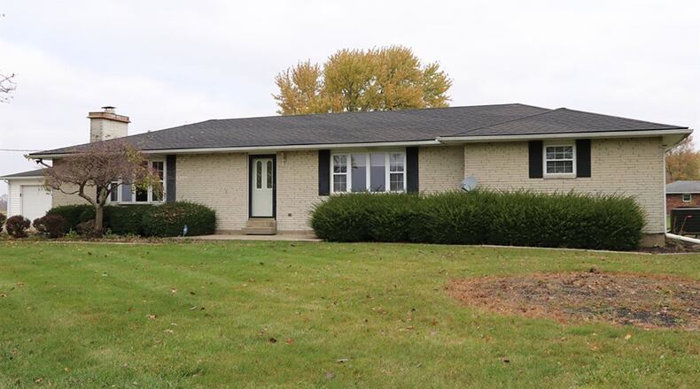 The house has about 1,900 sq. ft. of living space and sits on 1.6 acres. It has an oversized, 2-car, detached garage. The in-ground swimming pool needs some work. CONTRIBUTED PHOTOS BY KATHY TYLER